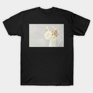 White flowers in jug. Roses in jug. T-Shirt